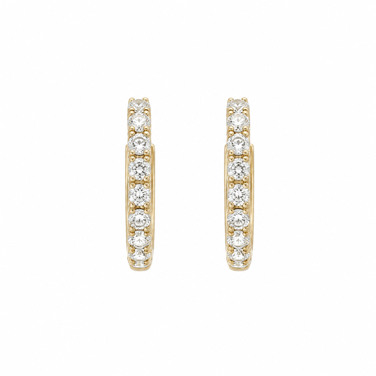 A pair of gold hoop earrings set with round-cut clear gemstones, shown against a plain white background