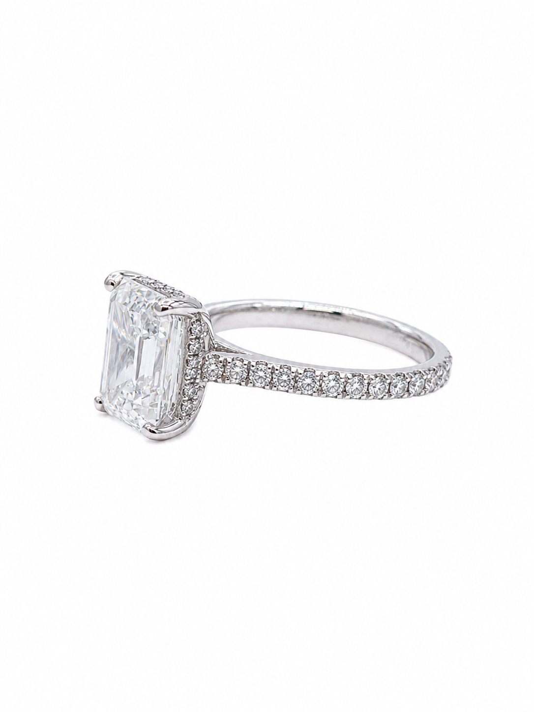 Lab Emerald Hidden Halo Three Quarters Engagement Ring